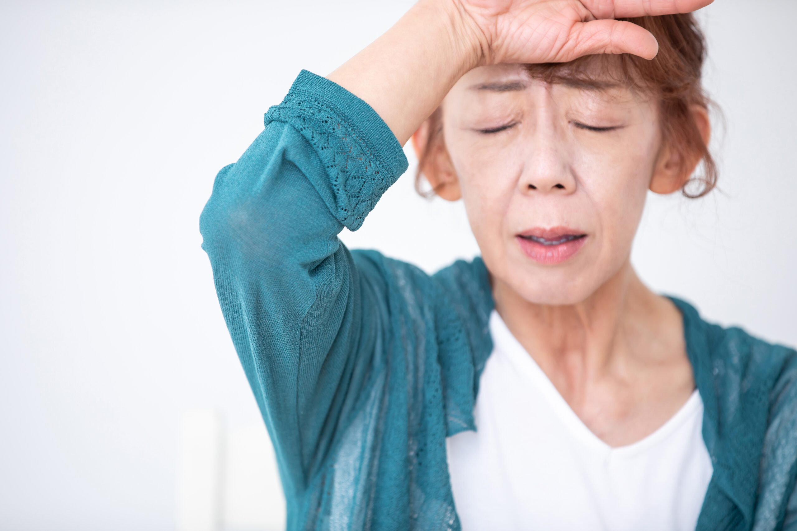 Woman suffering from heat