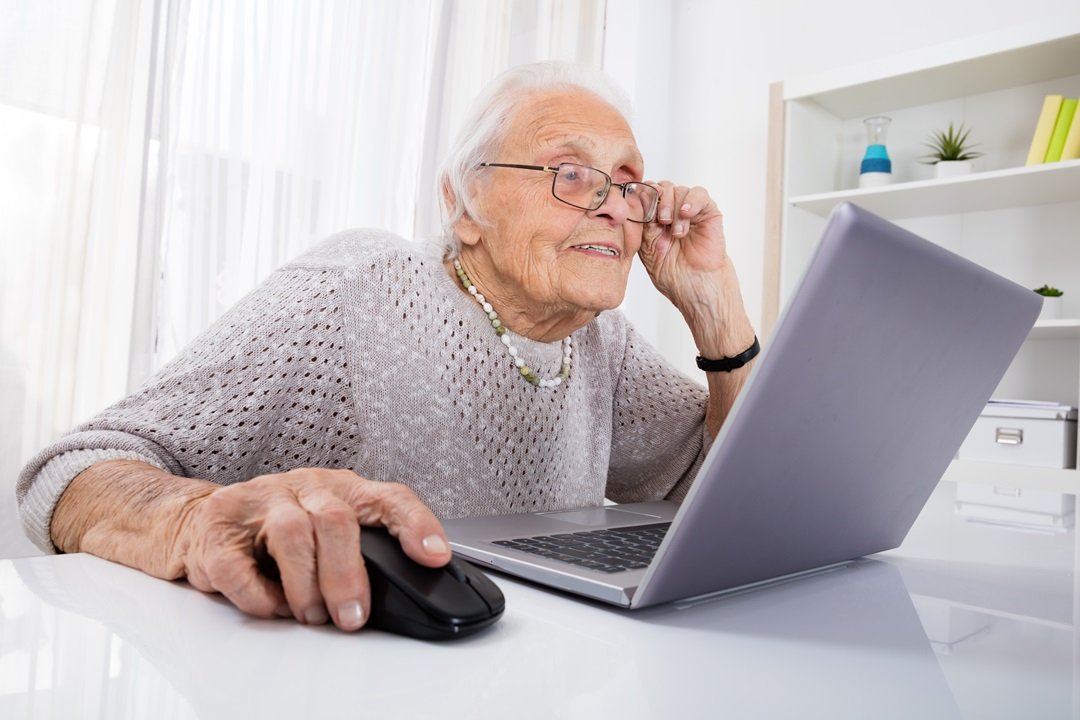 Senior woman undertaking online Maintain Your Brain coaching